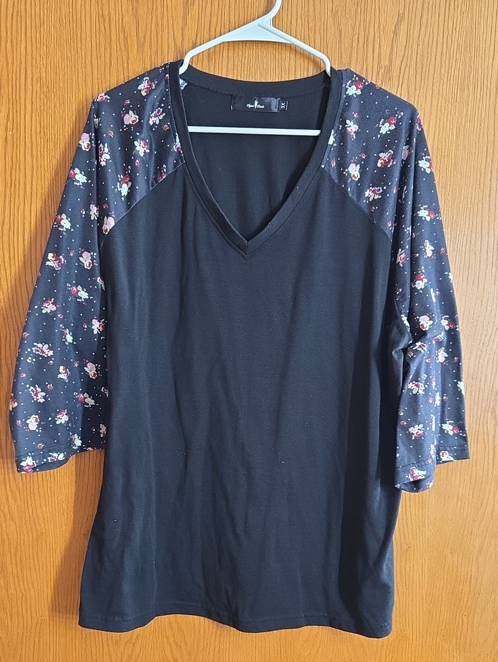 Black V-Neck Women's Top with Floral Raglan Sleeves